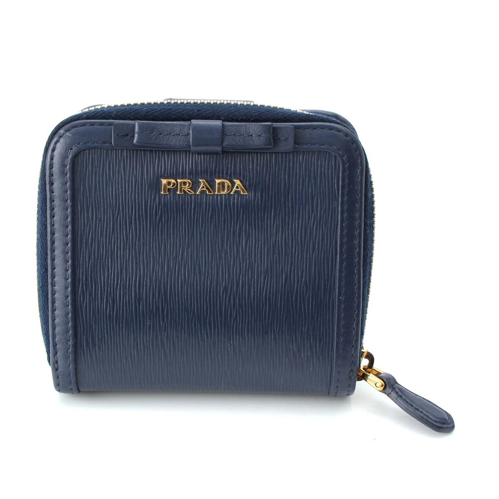 Prada Vitello Move Round Zipper Ribbon Compact Wallet Bi fold Navy Blue